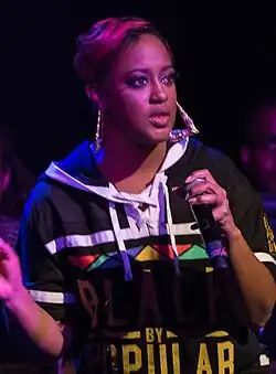 Rapsody performing in 2018