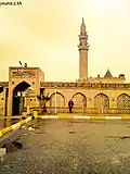 The mosque and shrine in 2011, prior to its 2014 demolition by ISIL