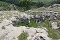 Pit (cistern or storage) on the rock barrier
