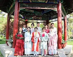 Some students wearing diverse forms of Hanfu during a spring outing.
