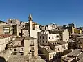Rooftops of the historic center, with a view of the rear of the Santa Lucia Church.