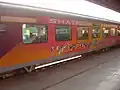 12018 Shatabdi Express in Commonwealth Games livery