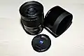 Sony A Zeiss 135mm f1.8 ZA lens with lens cap and SH0003 lens hood