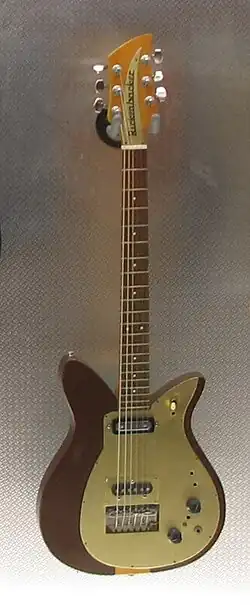 A 1957 Rickenbacker combo 400 with "tulip" style cutaways, and an added bridge pickup.