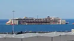 Wreck arriving at Genoa, 27 July 2014