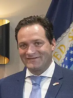 A portrait photo of Robert Totschnig in a suit