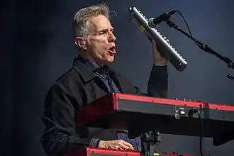 Hyman performing with the Hooters in 2022