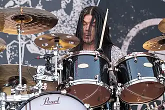 Erlandsson performing with Arch Enemy in 2023