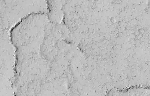 Close view of ridges on crater floor, as seen by HiRISE under HiWish program. Ridges are seen to be breaking up into boulders.