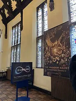 The hall: stained glass windows on east wall.