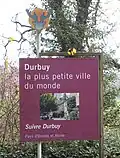 City limit sign representing Durbuy as the smallest city in the world
