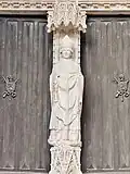 Statue of Saint Owen on the trumeau of the Portail des Marmousets after restoration.