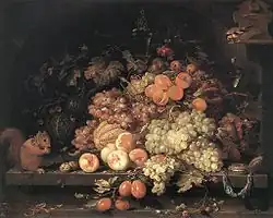 heap of fruit with a squirrel and a bird