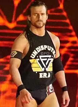 Adam Cole (L)