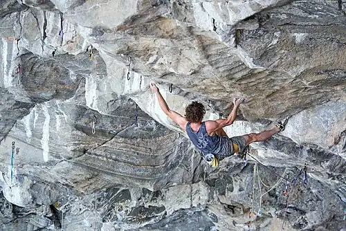 Czeh climber Adam Ondra on the climb known as Silence, the world's first 9c (French), 5.15d (American YDS), and XII+ (UIAA) graded lead climb