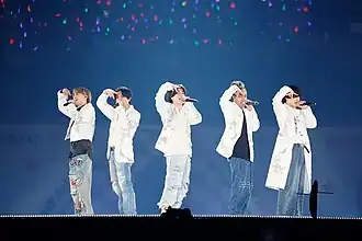 Ae! Group appearance at Kyocera Dome in 2024. From left to right: Ken Kojima, Yoshinori Masakado, Seiya Suezawa, Keita Richard Kusama, and Masaya Sano.