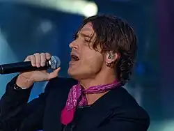 A man with a microphone.