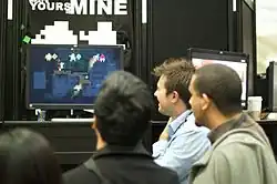 Andy Schatz displaying an early version of Monaco to onlookers at the Game Developers Conference in 2010