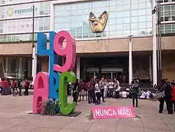 The sculpture features a number 49 above the letters ABC.