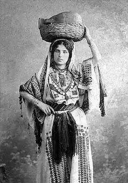 A Traditional Women's Dress in Ramallah, c. 1920.