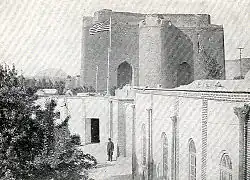 A US flag flies over the US Consulate near the Arg during the Persian Constitutional Revolution.