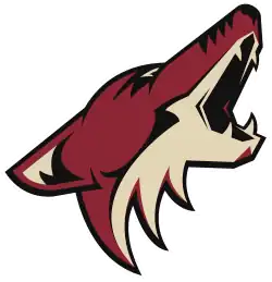 A logo of a coyote howling
