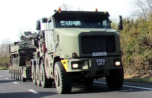 A British Army Oshkosh M1070F and a 7-axle King GTS 110/7 semi-trailer