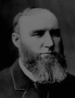 Head-and-shoulders frontal photograph of Asa Ribble