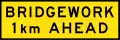 (T1-29) Bridgework 1 km ahead