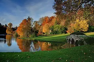 Image 21Autumn colours at Stourhead, an English landscape garden (from List of garden types)
