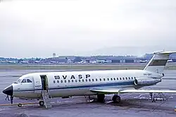 Another plane on the tarmac, with steps down