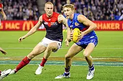 Bailey Dale evades Tom McDonald in Round 13, 2017