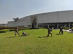 Green field and Statue