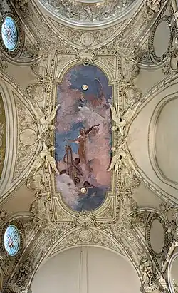Astonishing highly decorated ceiling in a salon