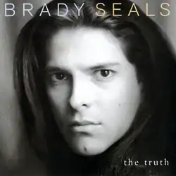 A black-and-white photo of Brady Seals. The text "Brady Seals" is above his head, and the text "The Truth" to the bottom right