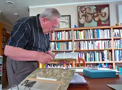 Brown in his Waiheke library, 2012