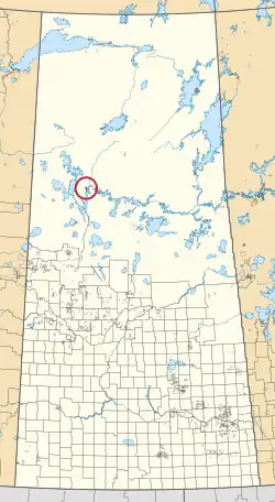 A map of the province of Saskatchewan showing 297 rural municipalities and hundreds of small Indian reserves. One is highlighted with a red circle.