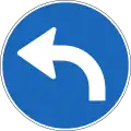 2.38 Must turn left ahead (on motorways: must change to the left road)
