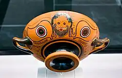 Fig. 16. Bearded snake-haired gorgoneion; kylix eye-cup, Munich, Staatliche Antikensammlungen 2027 (second half of the sixth century BC)[88]