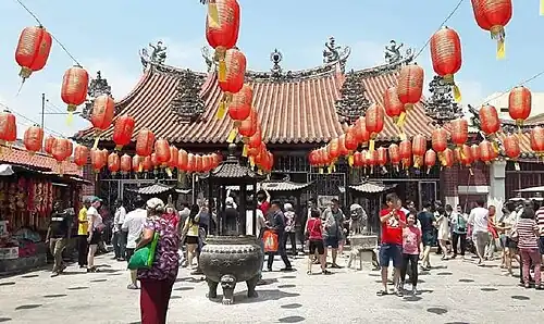 The main courtyard of the Guanyin Temple during Chinese New Year, decorated with red lanterns.