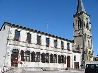 The town hall, school and church in Clézentaine