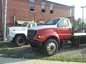 Class 6 2002 Ford F-650 in front (GVWR: 26000 lb), 1989 Ford F-600 in back (GVWR: 20,200 pounds (9.2 t)