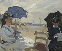 La plage de Trouville, 1870, National Gallery, London. The left figure may be Camille, on the right possibly the wife of Eugène Boudin, whose beach scenes influenced Monet.[72]