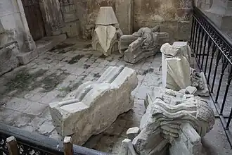 Keystones and lapidary remains deposited in the church