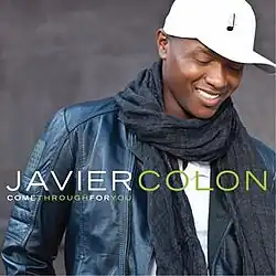 The grey cover consists of Javier Colon wearing a white shirt, dark blue leather jacket, long black scarf and a white baseball cap with a black quarter note. The artist's name appears below him, while the album title is placed under the aritst's first name. "Javier", "Come" and "For" are colored in white, while "Colon", "Through" and "You" are colored in green.