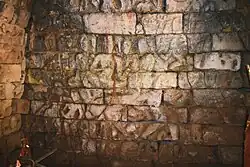 The worn relief on the inside back (west) wall