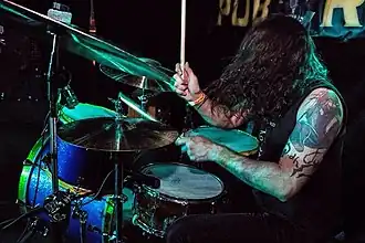 DeLaPaz performing in 2014