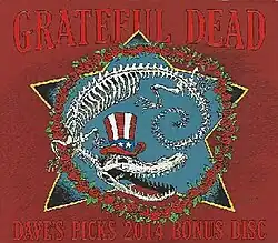 The skeleton of an alligator, wearing an Uncle Sam hat and encircled by a wreath of roses