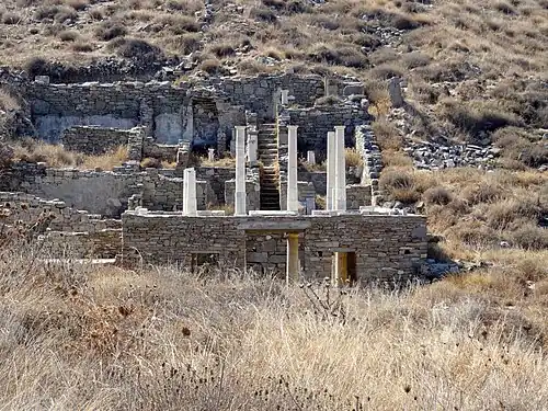 Two stories of Corinthian atria/peristyles. House of the Hermes, Roman-era Delos.