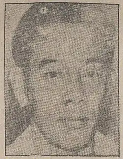 black and white grainy portrait of an Indonesian man's face
